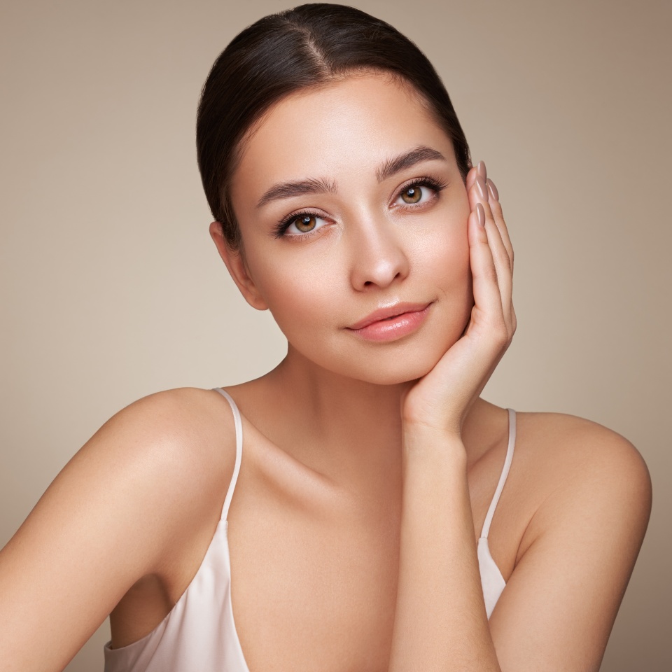 Portrait beautiful young woman with clean fresh skin. Model with healthy skin, close up portrait. Cosmetology, beauty and spa
