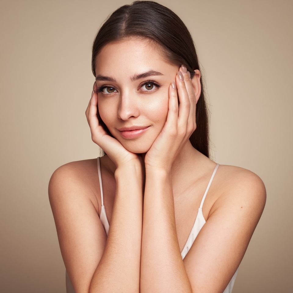 Portrait beautiful young woman with clean fresh skin. Model with healthy skin, close up portrait. Cosmetology, beauty and spa