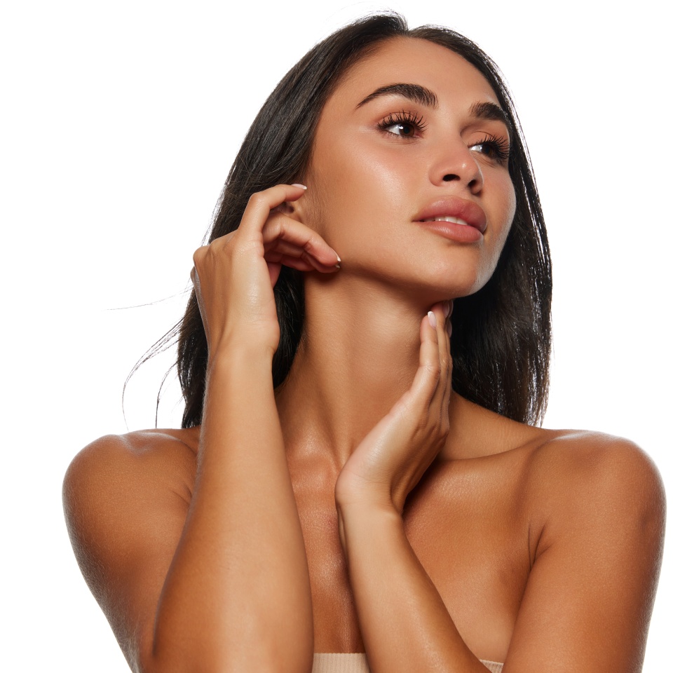 Face building massage. Portrait of beautiful young woman with perfect face lines, tanned spotless skin isolated on white background. Female beauty, skin and body care, cosmetology, cosmetics concept