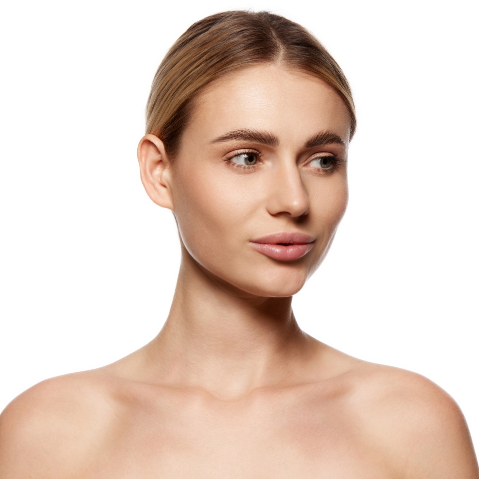 Pursuit of natural, radiant beauty. Beautiful young woman with clear face, small nose and plump lips isolated on white background. Concept of beauty, plastic surgery, face lifting, face building